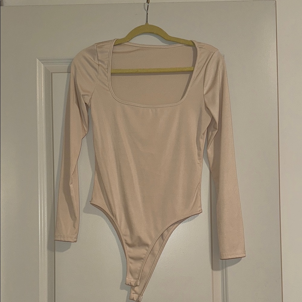 Women’s cream bodysuit